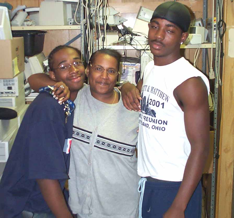 Anthony Dunn, Dorothy Hunter and Jermaine Hunter are happy to get <br>their new computers for Emmanuel Christian Church