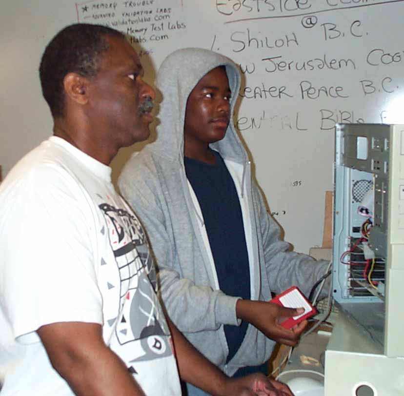 >CAP volunteer Billy Foster training a student