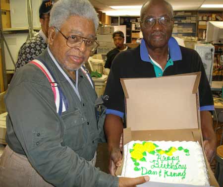 Dan Davenport and Ken Eskridge share a birthday cake