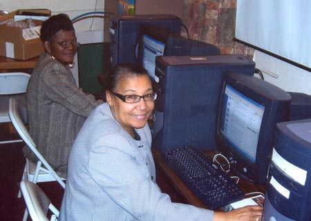 Deaconess Pat Freeman and Deborah France at the new Straightway Project PC lab