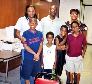 parents Angela Horn, Greg  Oliver and Cynthia Oliver with students Greg, Michael and Javon Oliver and Jordan Horn