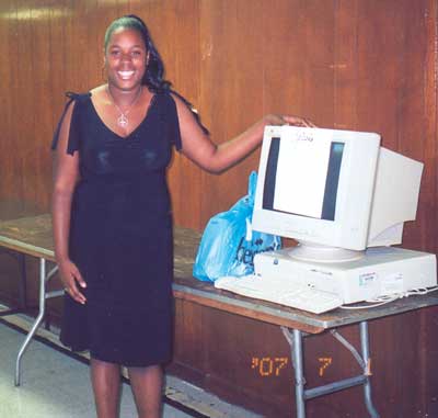 Proud graduates and new computer owners